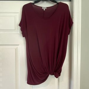 Like new! Maroon top with cross front!